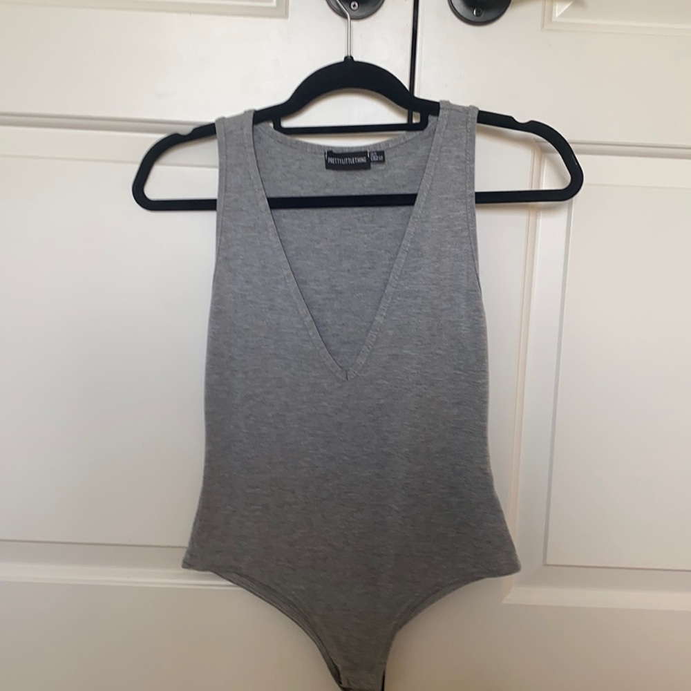 Grey plug front bodysuit
